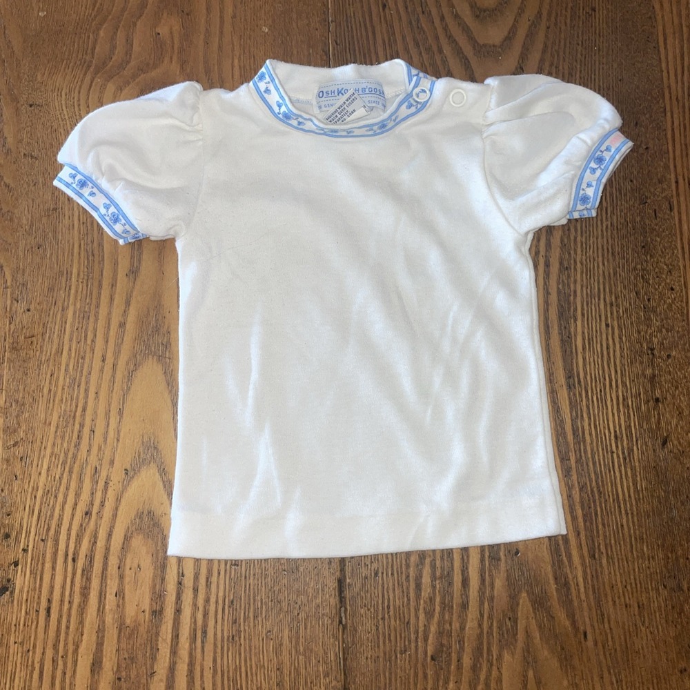 Vintage OshKosh B'Gosh Girls Shirt 6-9 Months Blue Floral trim at neck and arms